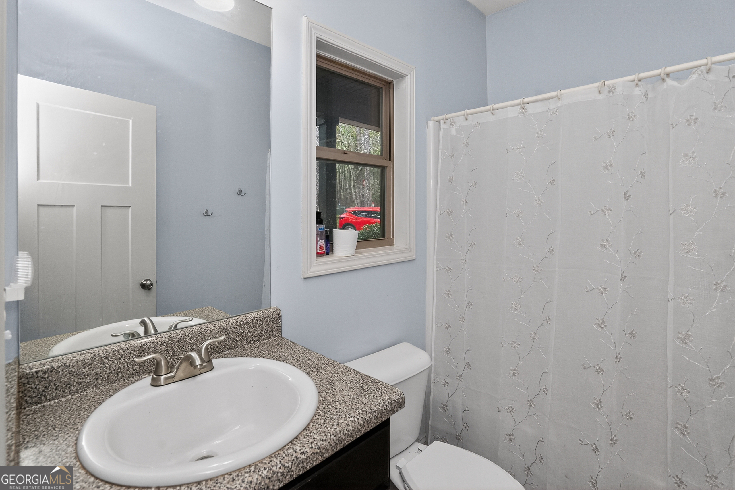 39 Crow Court Monticello, GA 31064 - Photo 25 of 39 a bathroom with a sink and a toilet