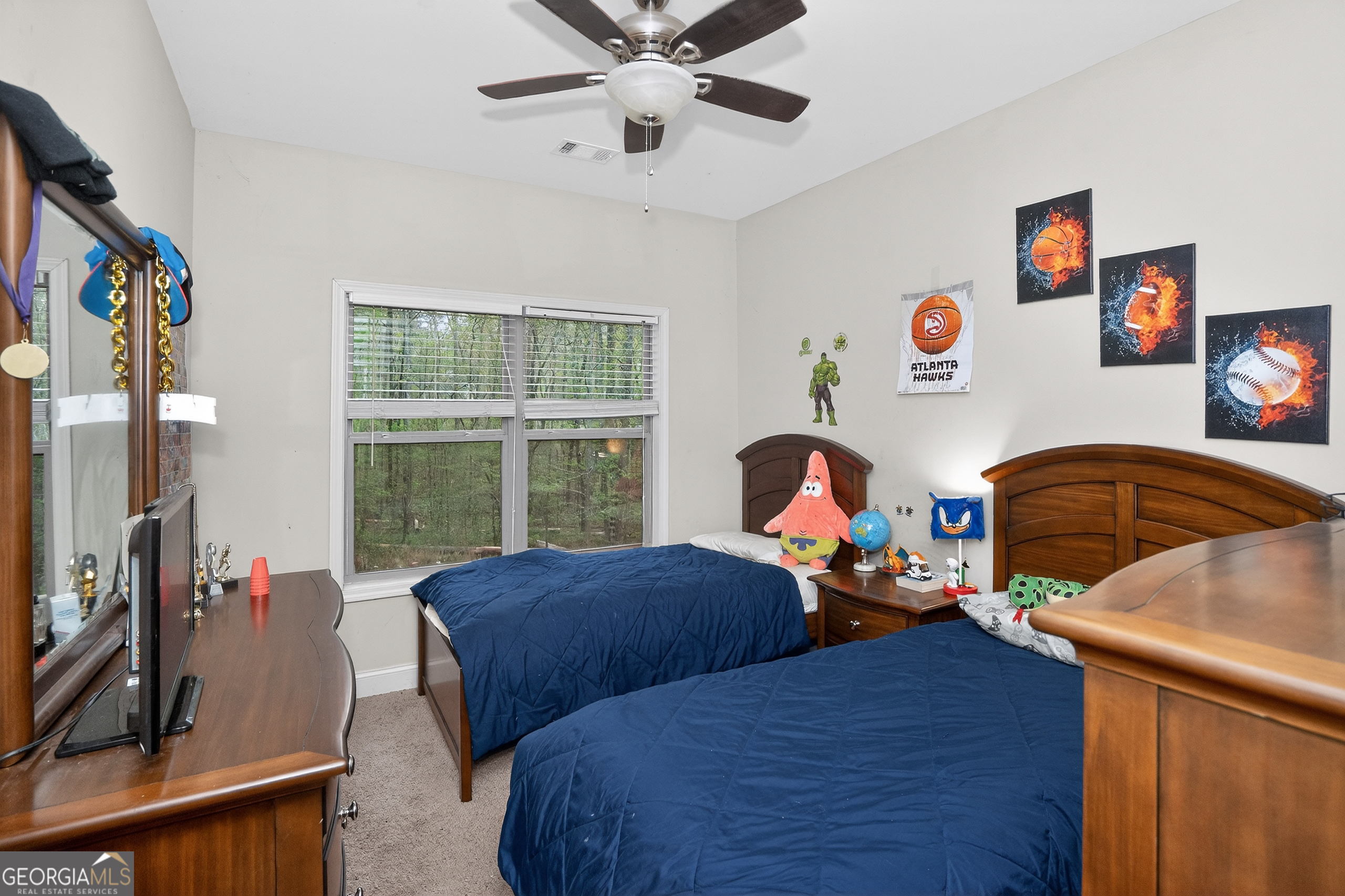 39 Crow Court Monticello, GA 31064 - Photo 26 of 39 a bedroom with two beds and a large window