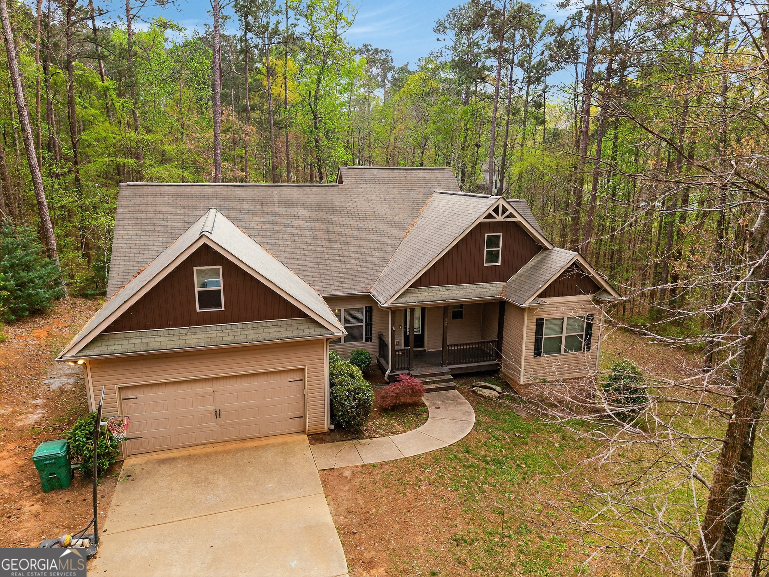 39 Crow Court Monticello, GA 31064 - Photo 3 of 39 a house with trees in the background