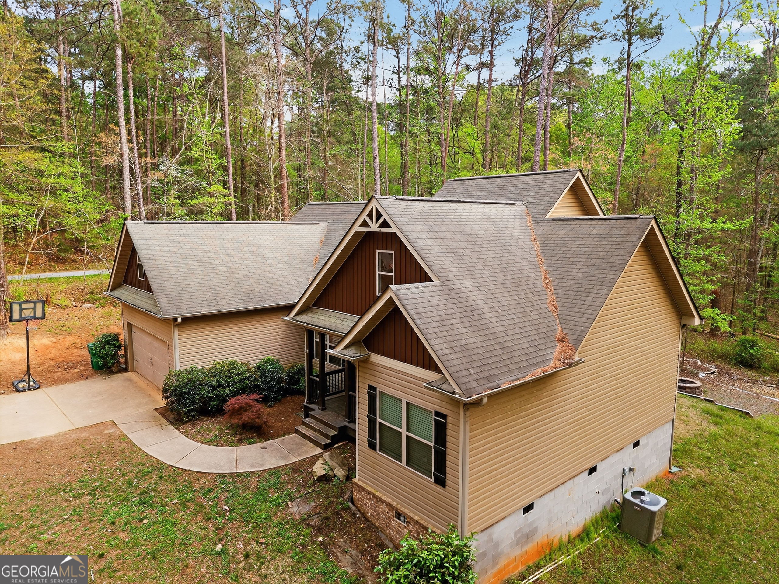 39 Crow Court Monticello, GA 31064 - Photo 6 of 39 an aerial view of a house with a yard table and chairs
