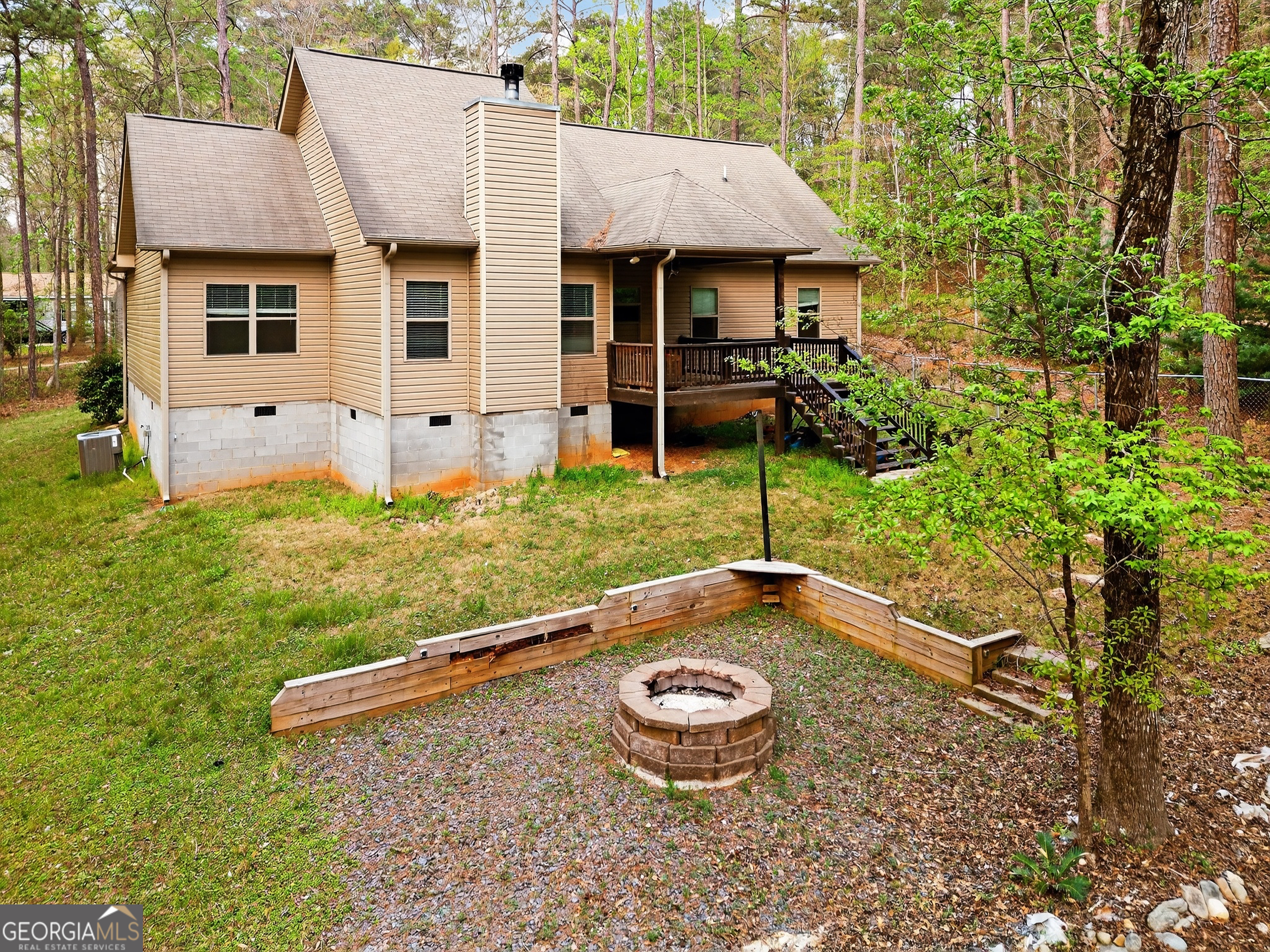 39 Crow Court Monticello, GA 31064 - Photo 9 of 39 front view of a house with a yard
