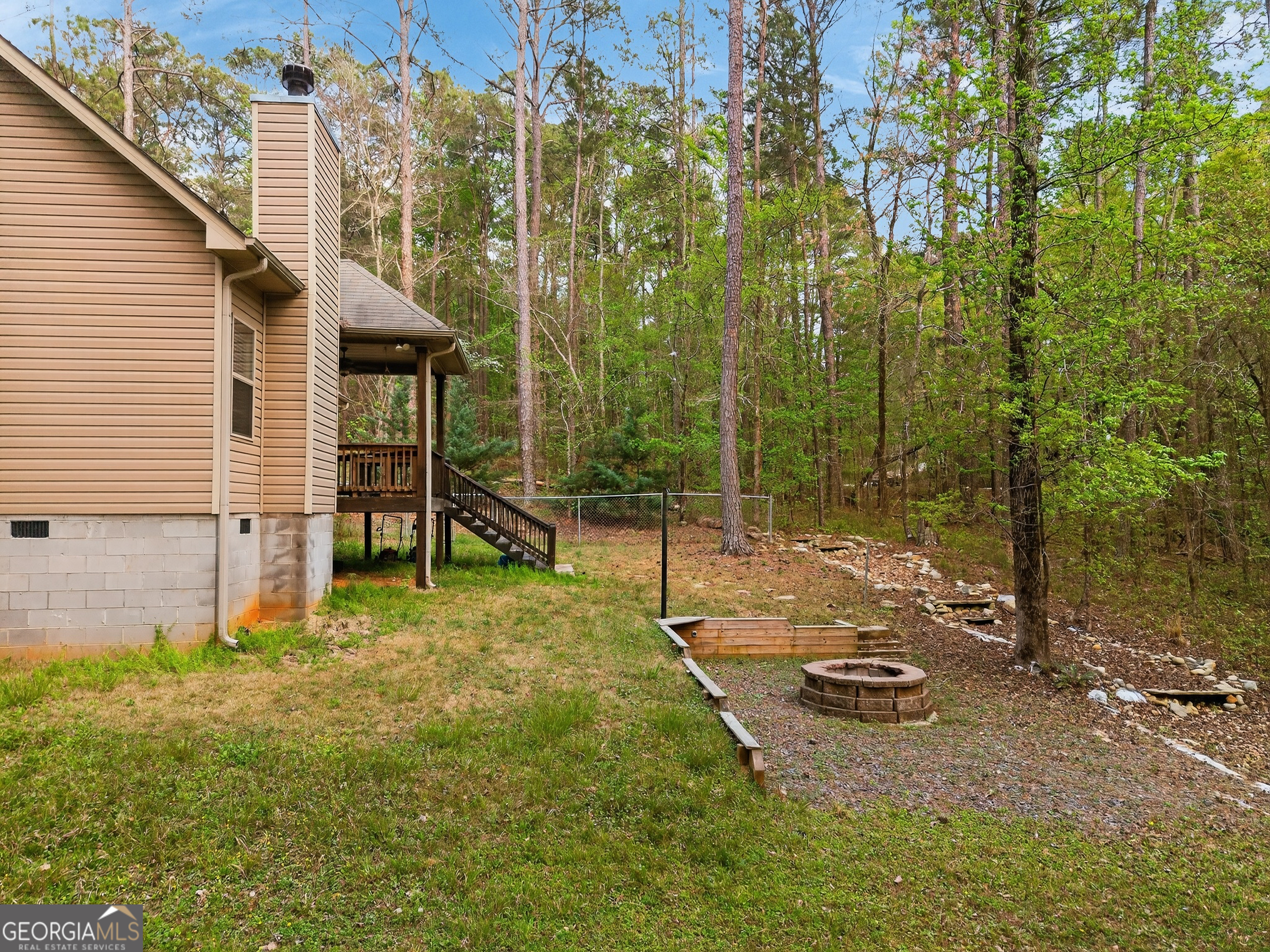 39 Crow Court Monticello, GA 31064 - Photo 10 of 39 a view of a house with backyard and sitting area
