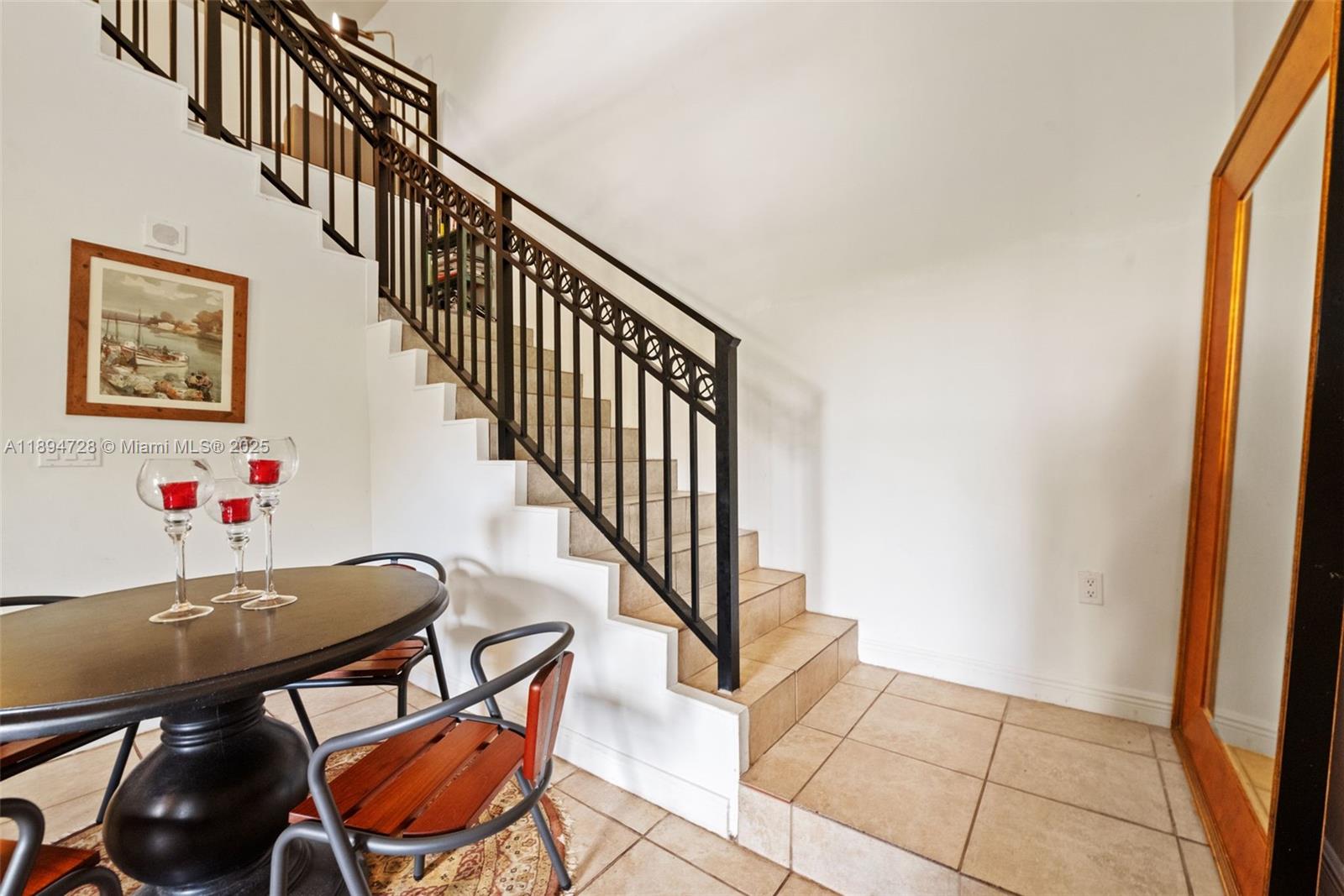 888 Douglas Road, Unit 113 Coral Gables, FL 33134 - Photo 22 of 40 a view of entryway and hall