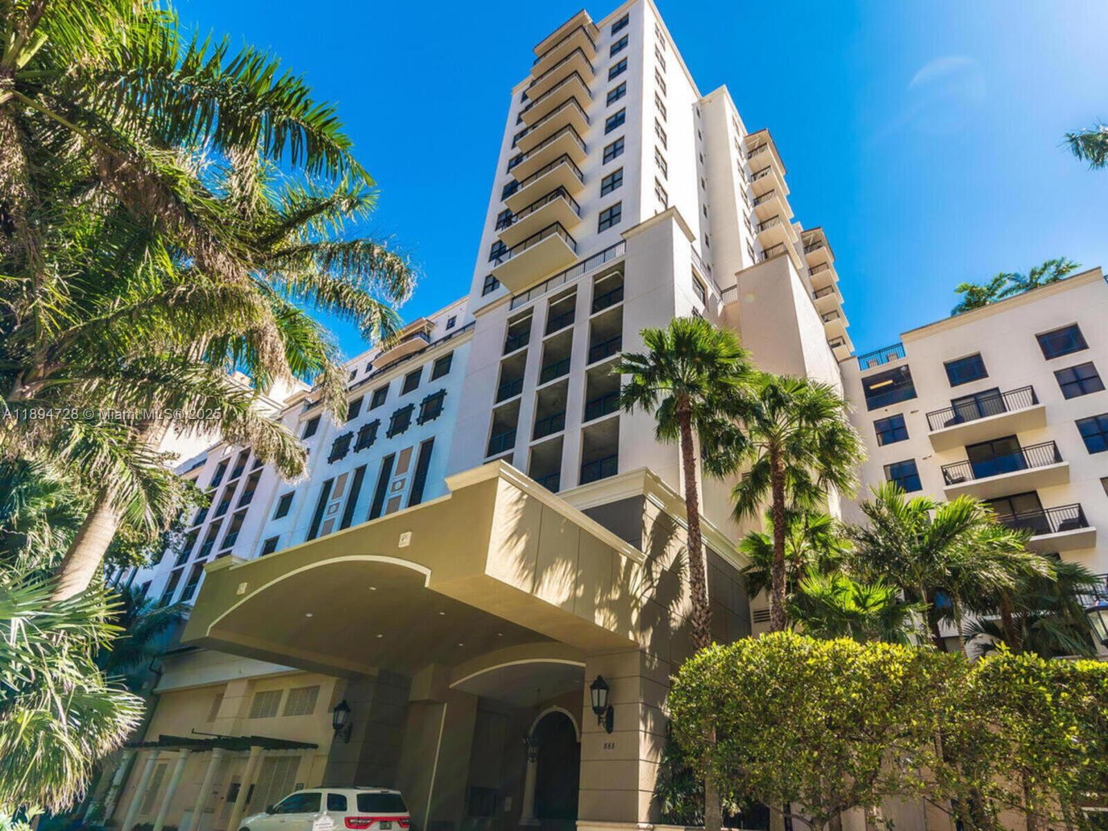 888 Douglas Road, Unit 113 Coral Gables, FL 33134 - Photo 3 of 40 a front view of a multi story building