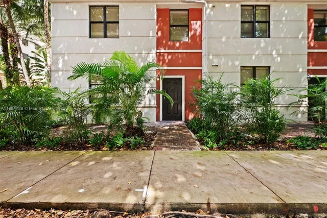 a front view of a multi story residential apartment building