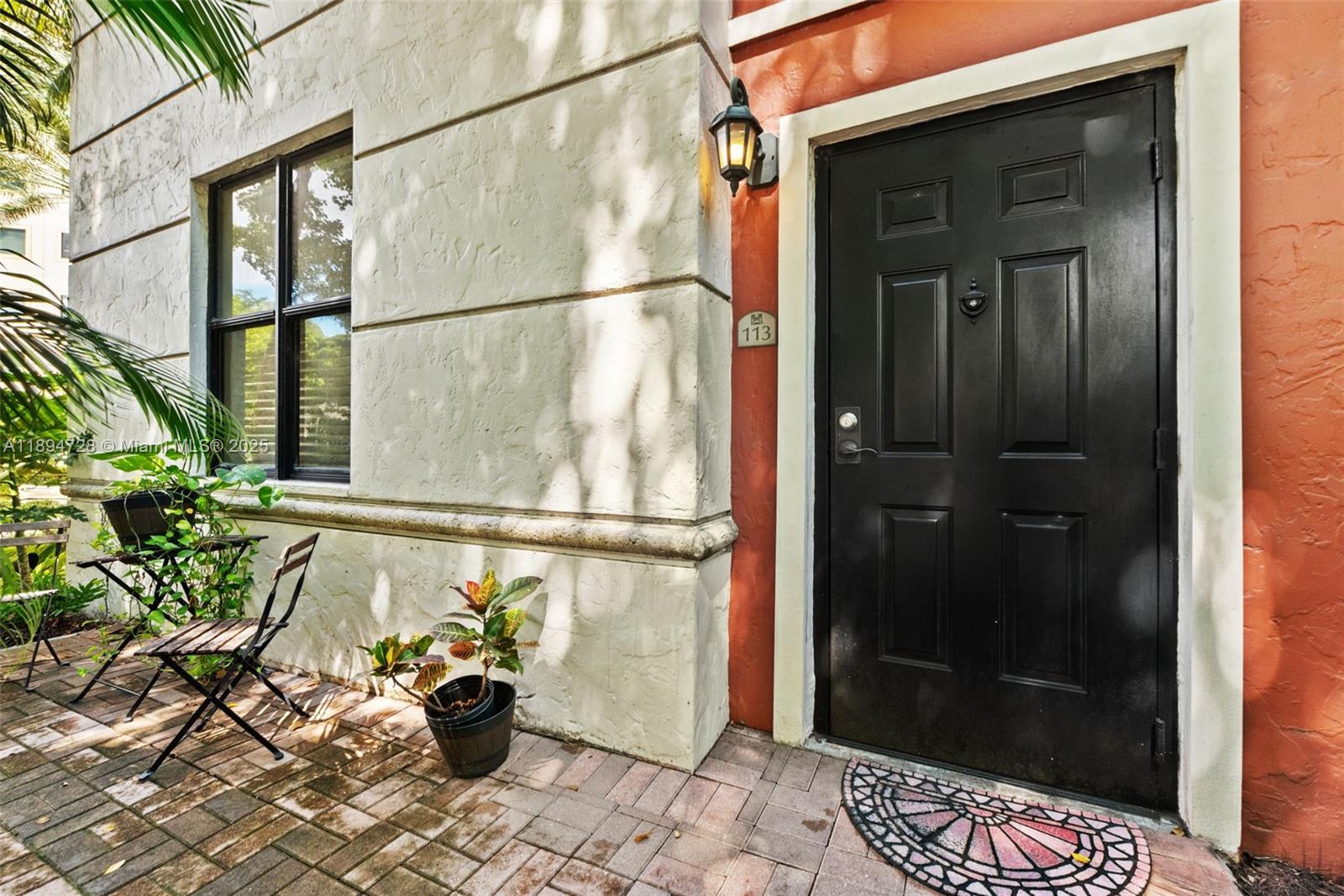 888 Douglas Road, Unit 113 Coral Gables, FL 33134 - Photo 9 of 40 a glass door with glass door and glass door