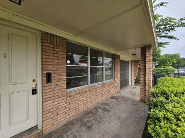 a view of house with front door