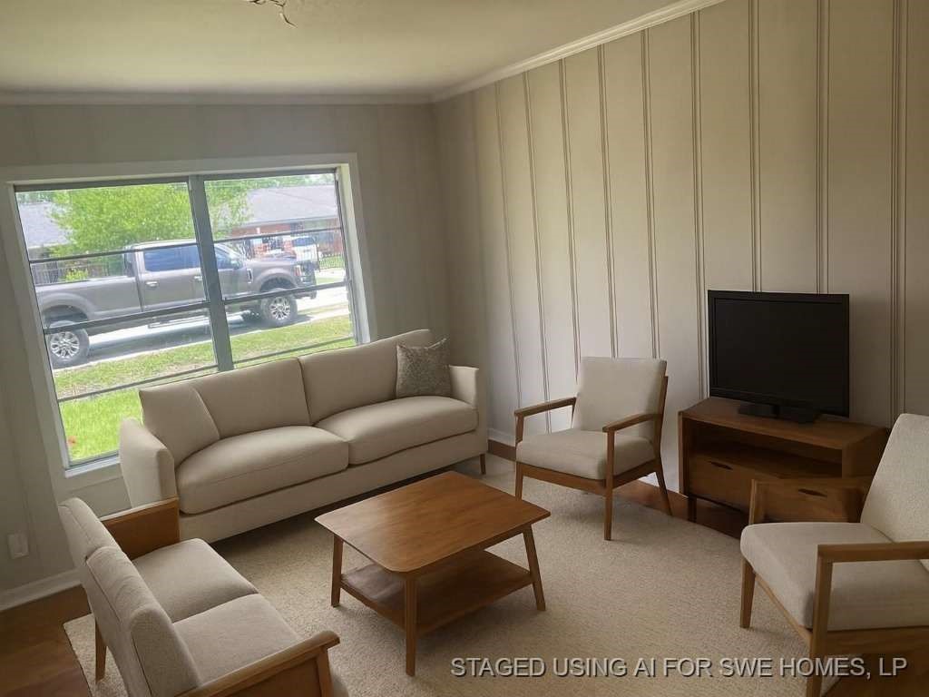 205 West Rittenhouse Street Houston, TX 77076 - Photo 6 of 17 a living room with furniture a rug and a window