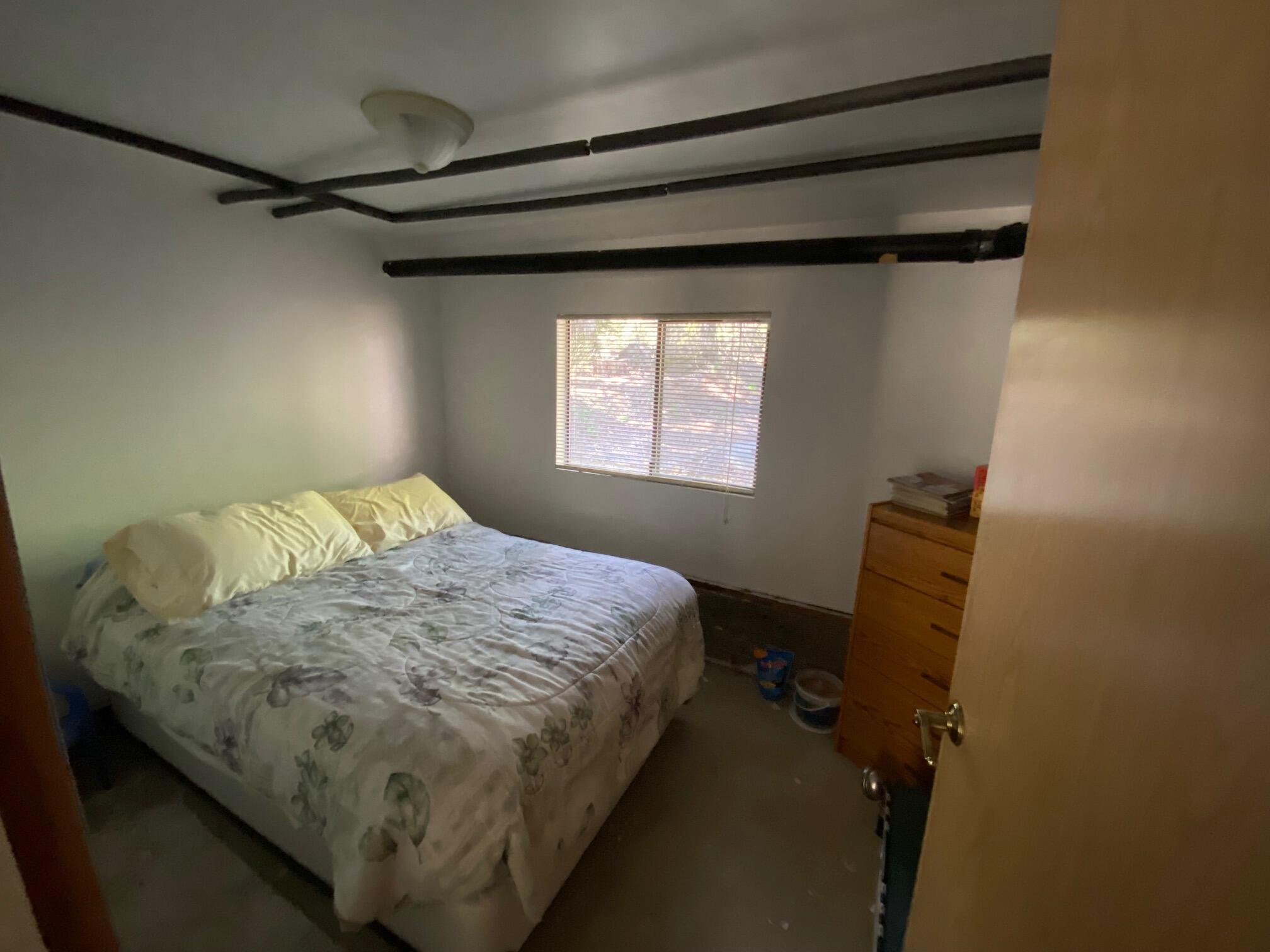 581 Mountain Aire Road Trinity Center, CA 96091 - Photo 13 of 48 Second bedroom downstairs of main house