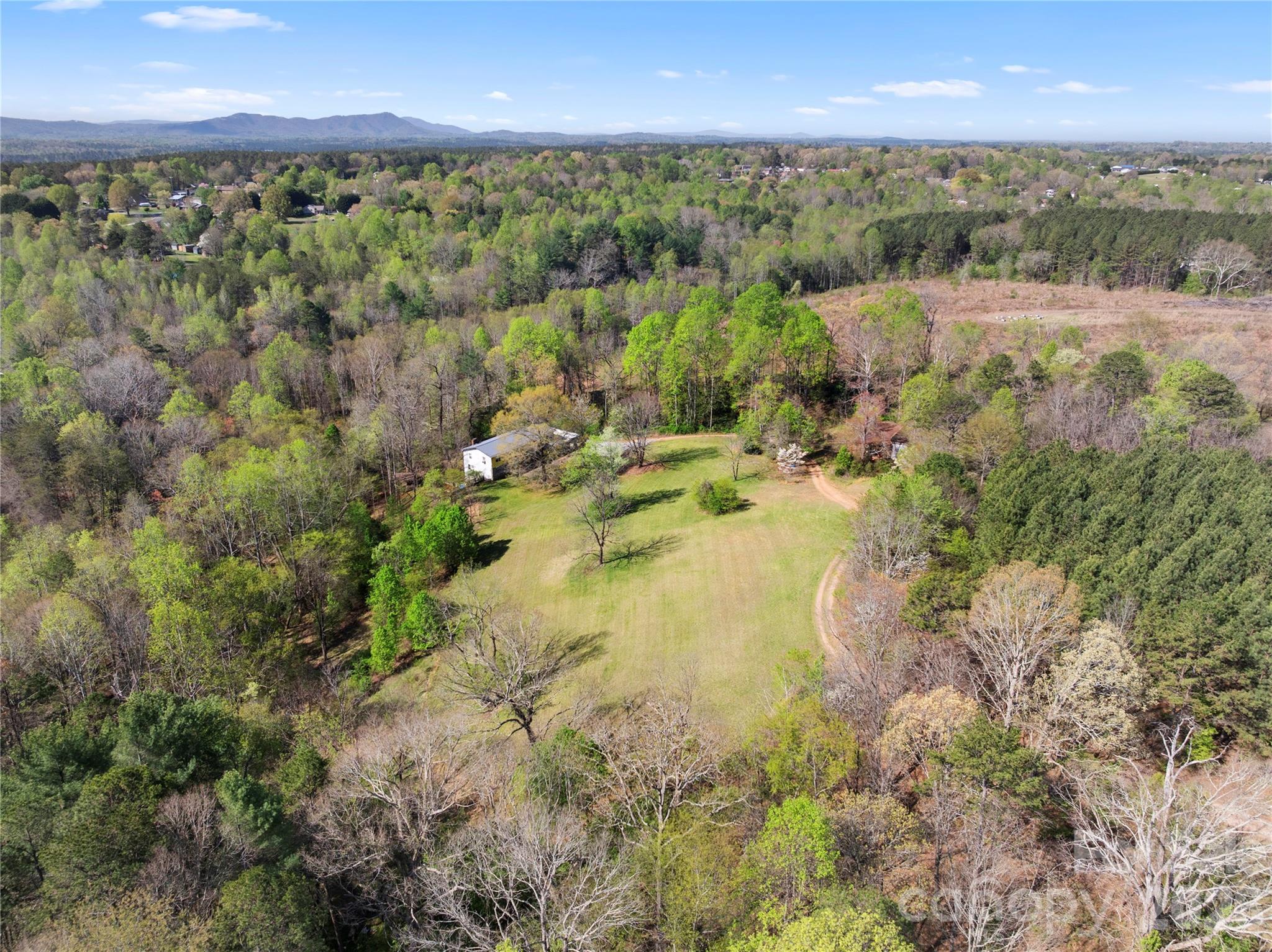 4675 Hickory Nut Ridge Road Granite Falls, NC 28630 - Photo 14 of 14 a view of a lake with a city
