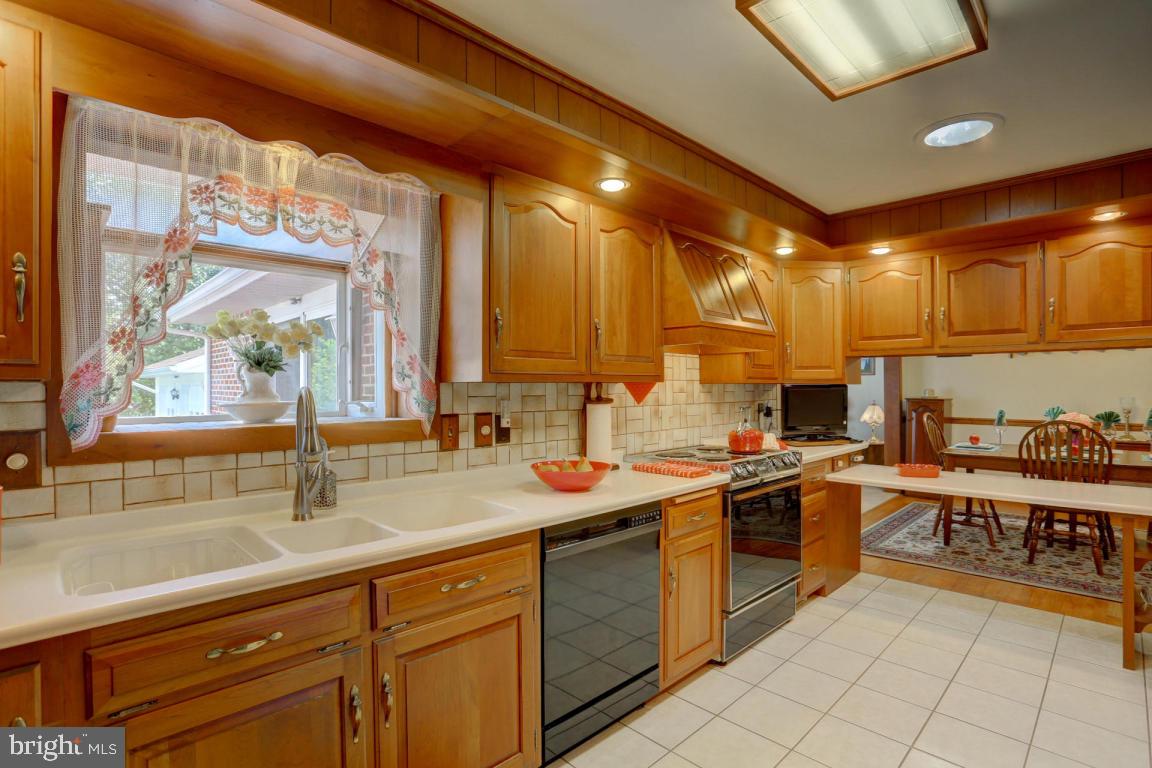 106 Brubaker Road Lititz, PA 17543 - Photo 4 of 25 a kitchen with stainless steel appliances granite countertop a sink and cabinets