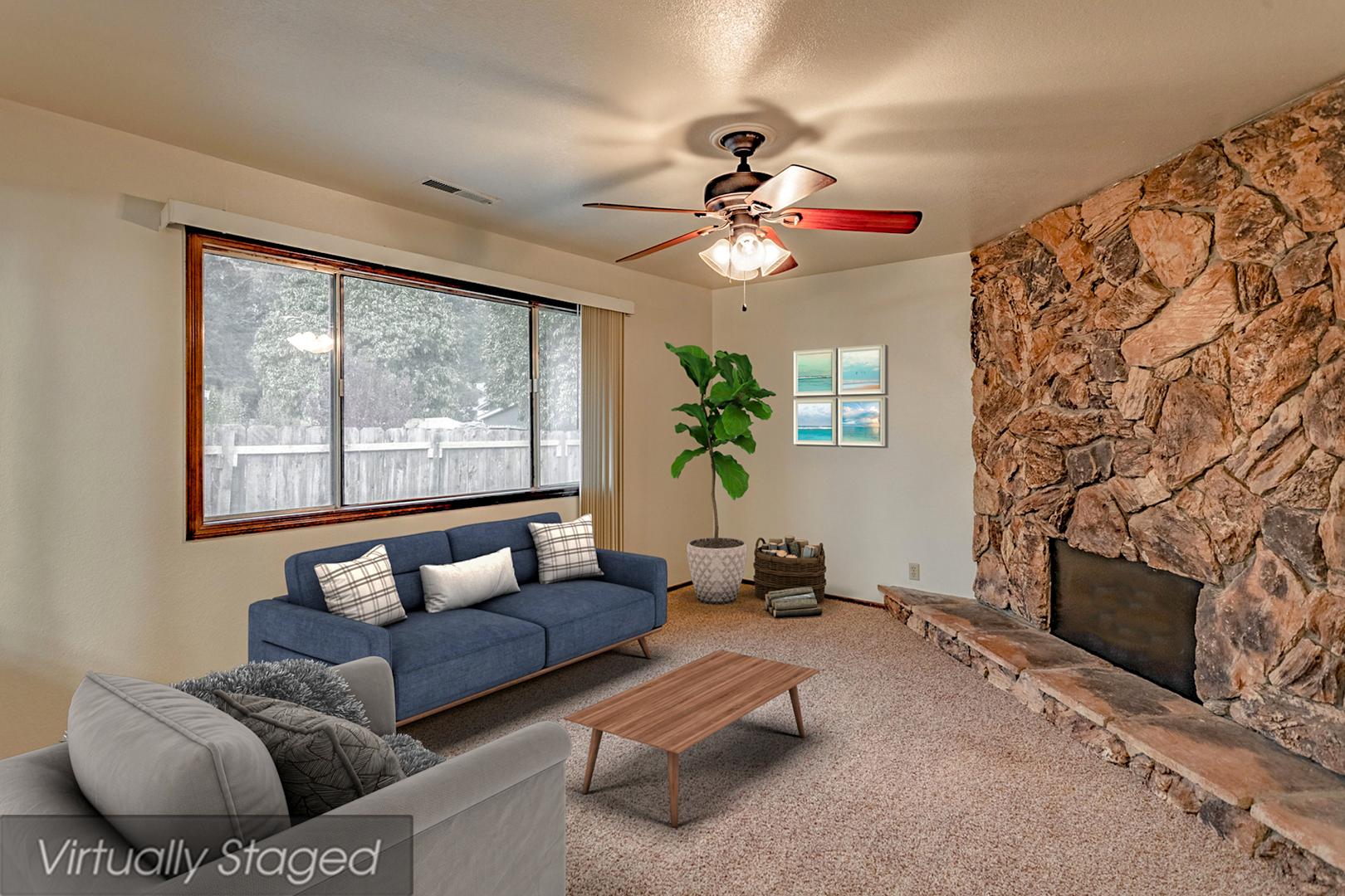 3612 Echo Road Redding, CA 96002 - Photo 2 of 10 a living room with furniture and a fireplace