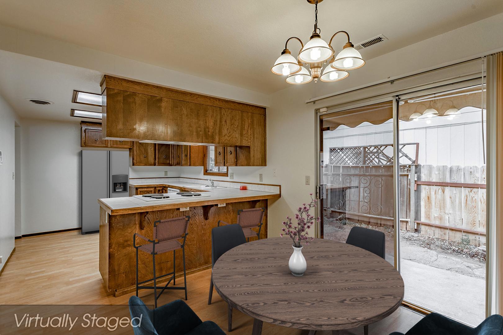 3612 Echo Road Redding, CA 96002 - Photo 3 of 10 a kitchen with a table and chairs