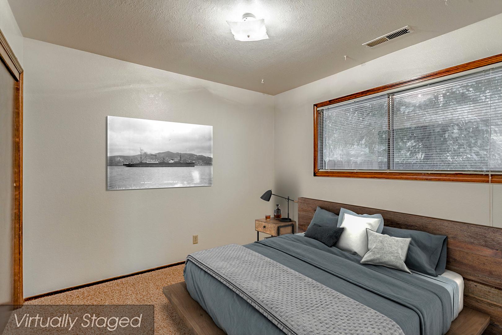 3612 Echo Road Redding, CA 96002 - Photo 4 of 10 a bedroom with a bed and a painting on the wall