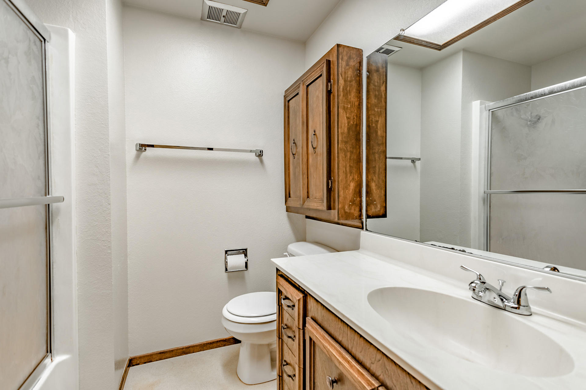 3612 Echo Road Redding, CA 96002 - Photo 9 of 10 a bathroom with a sink toilet and shower
