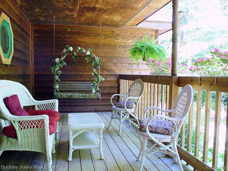 10202 Hyne Road Brighton, MI 48114 - Photo 17 of 21 Relaxing Front Porch