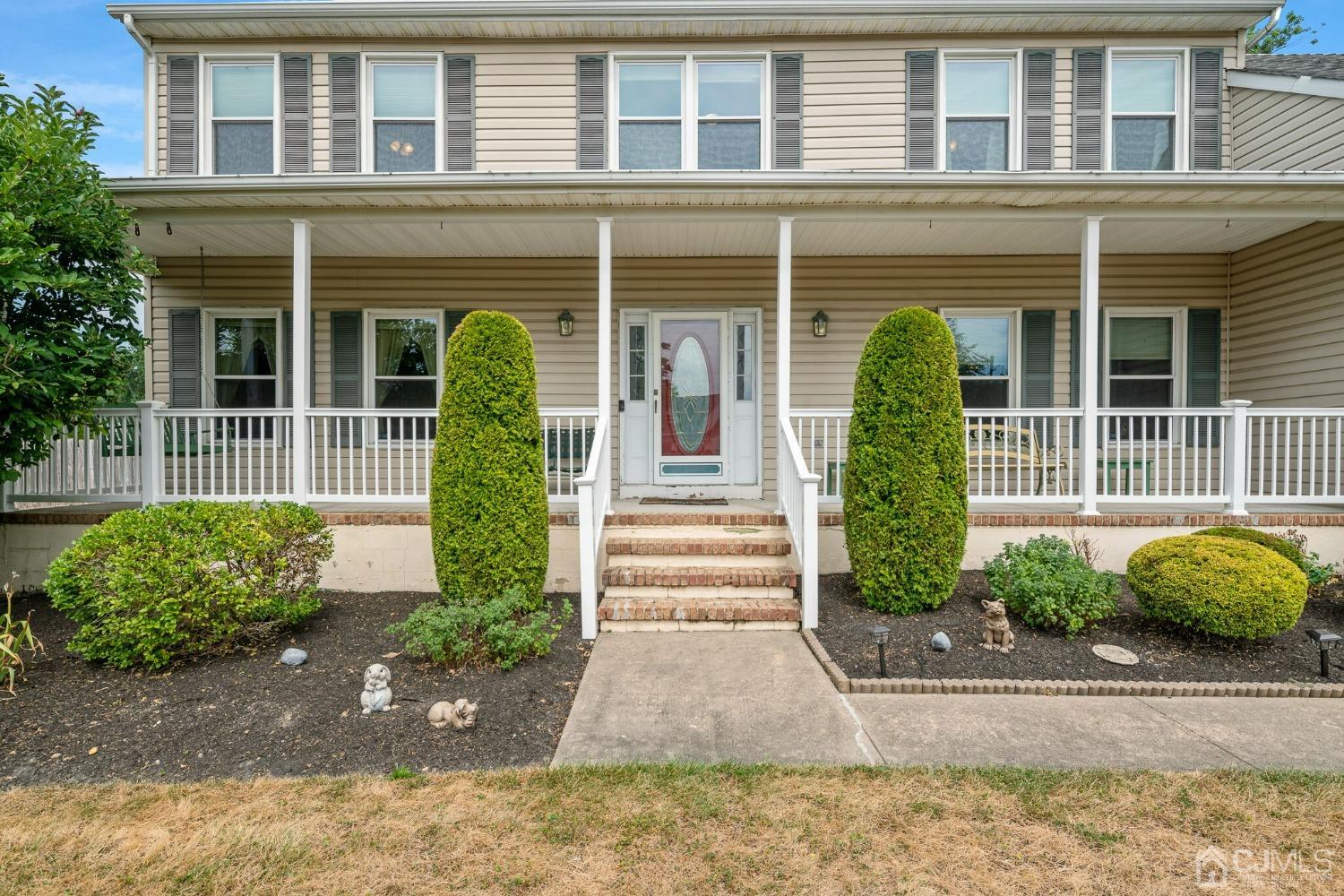 9 Jeana Court Monroe Township, NJ 08831 - Photo 1 of 28 a front view of a house having garden