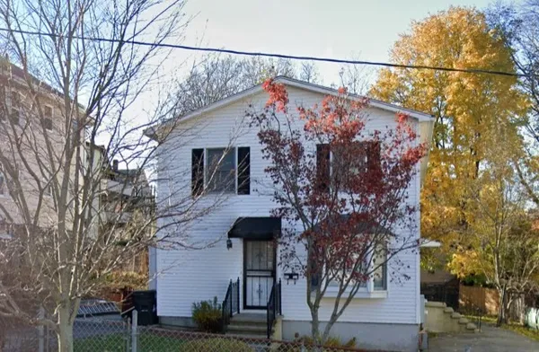 front view of a house with a street