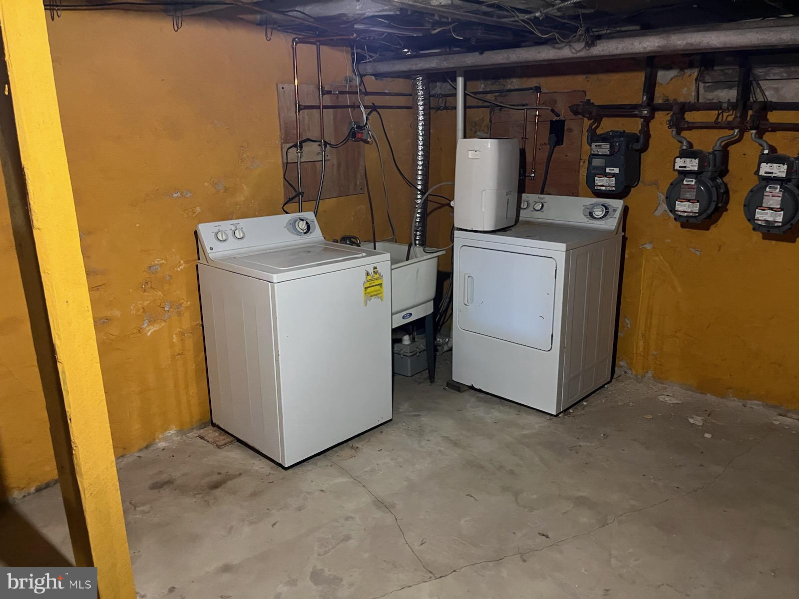 357 Lyceum Avenue, Unit A Philadelphia, PA 19128 - Photo 14 of 14 a utility room with dryer and washer