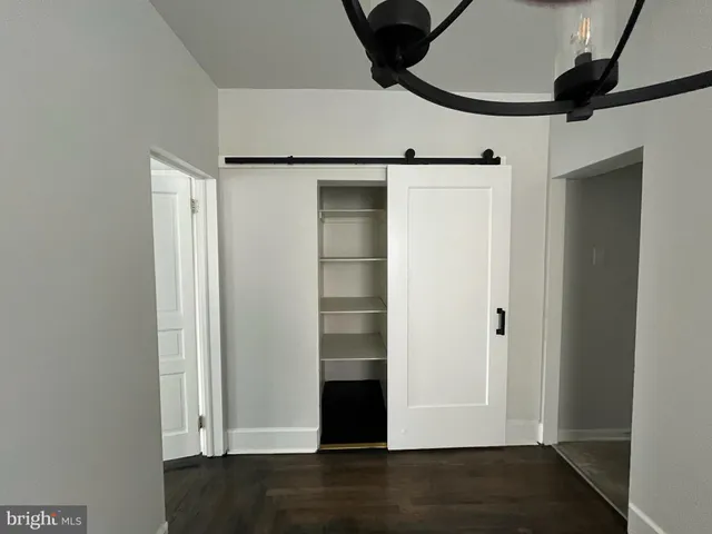 a view of entryway with wooden floor