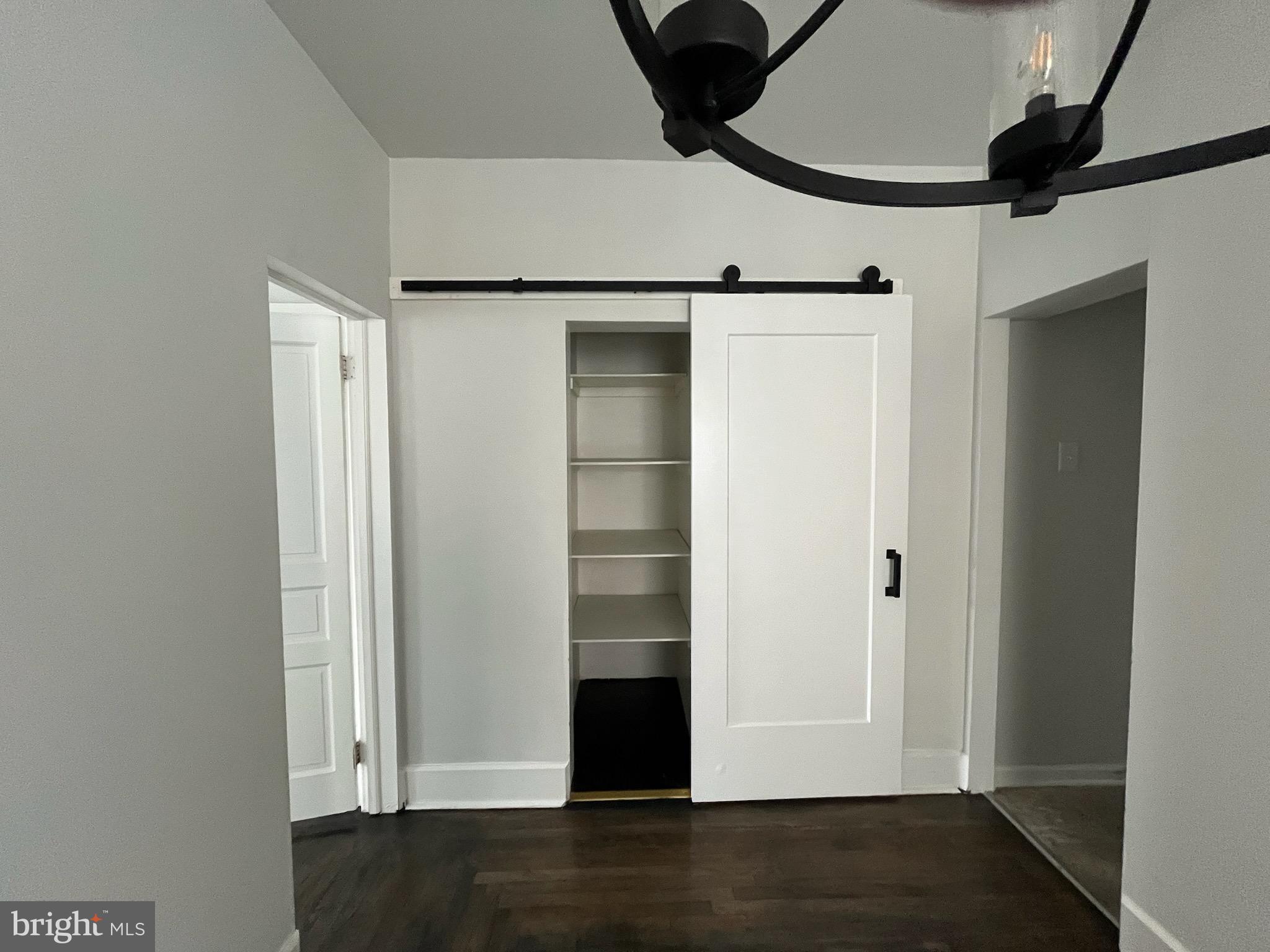 357 Lyceum Avenue, Unit A Philadelphia, PA 19128 - Photo 7 of 14 a view of entryway with wooden floor