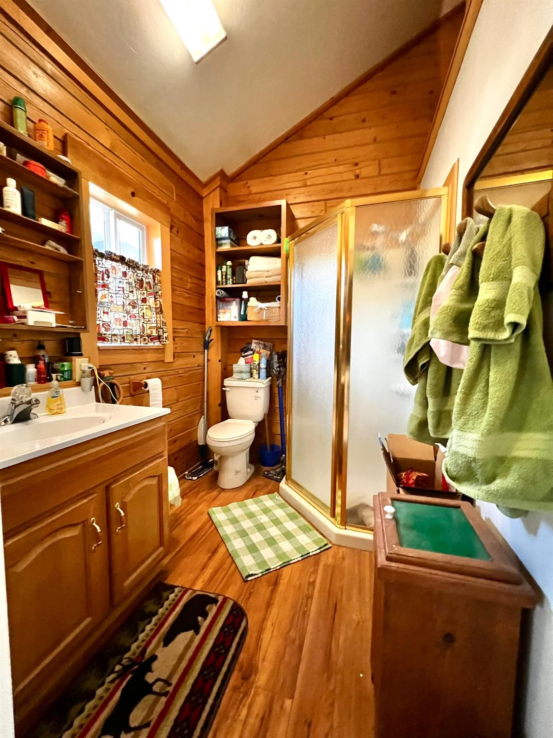 9110 Hidden Valley Road Mountain Ranch, CA 95246 - Photo 18 of 44 a bed room with a bed and a mirror