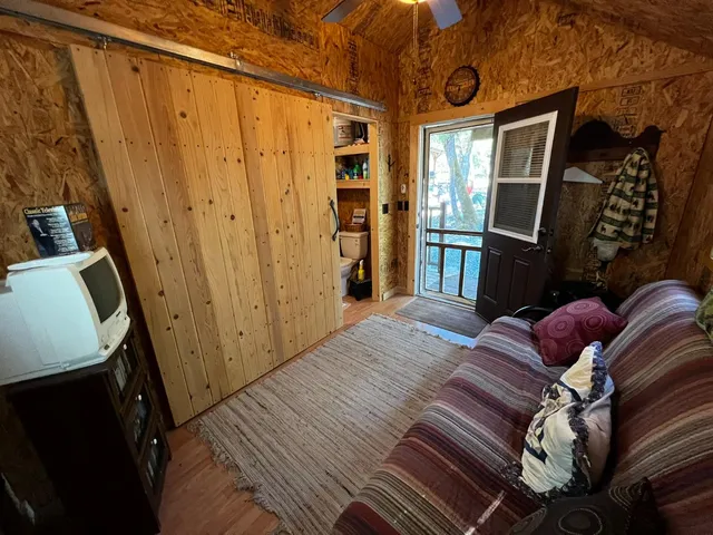 a view of house with snow on the road