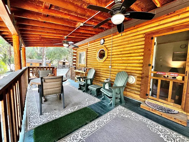 a view of a chairs and tables in the balcony