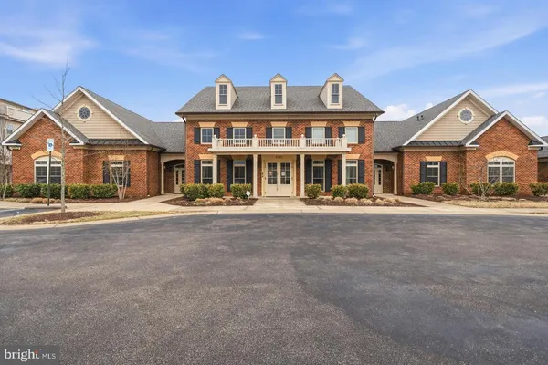 a front view of a multi story residential apartment building