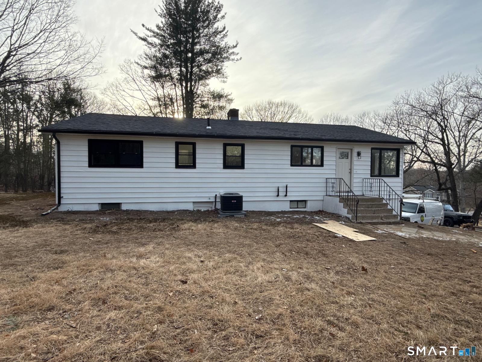 46 Bracewood Road Waterbury, CT 06706 - Photo 6 of 25 a view of a house with a yard