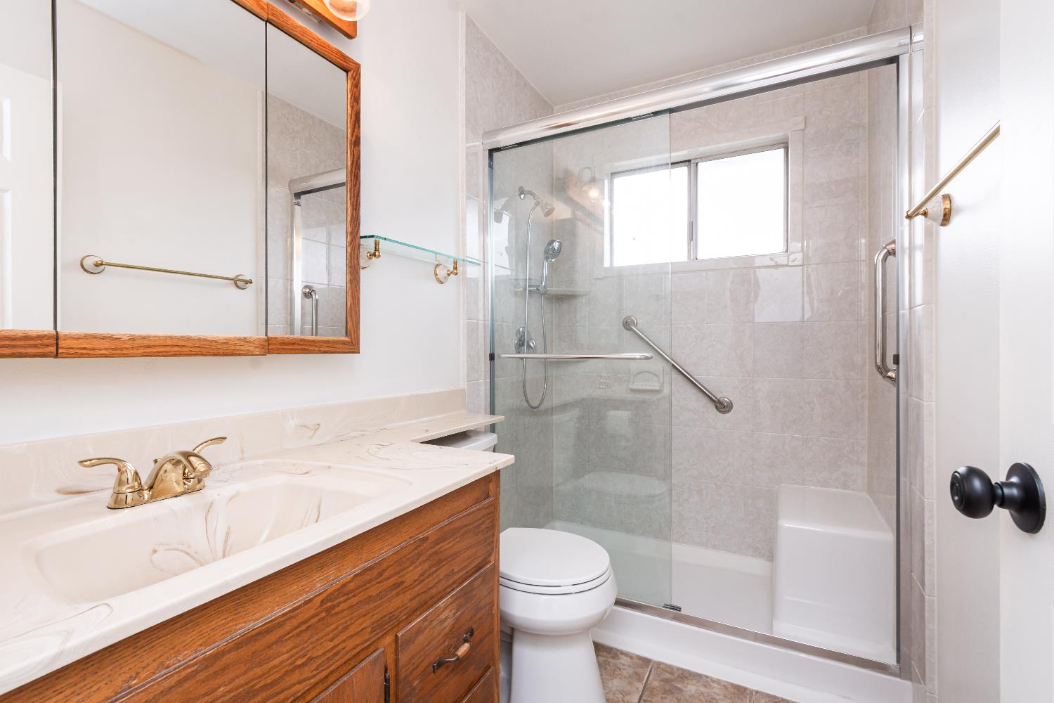 6312 Trenton Way Citrus Heights, CA 95621 - Photo 19 of 27 a bathroom with a sink a toilet and shower
