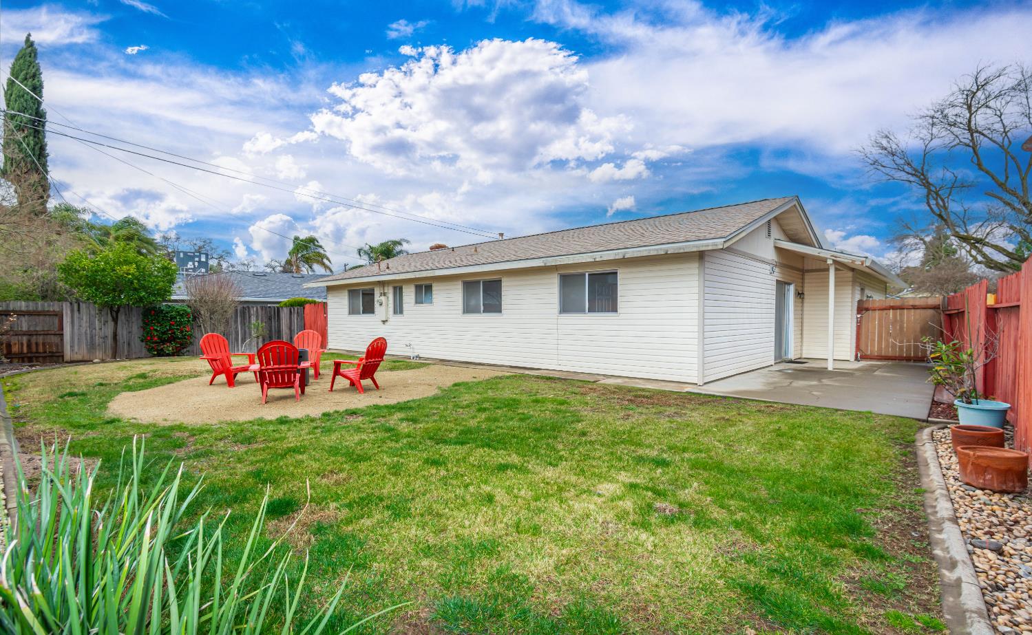 6312 Trenton Way Citrus Heights, CA 95621 - Photo 26 of 27 a view of a backyard with a sitting area and slide