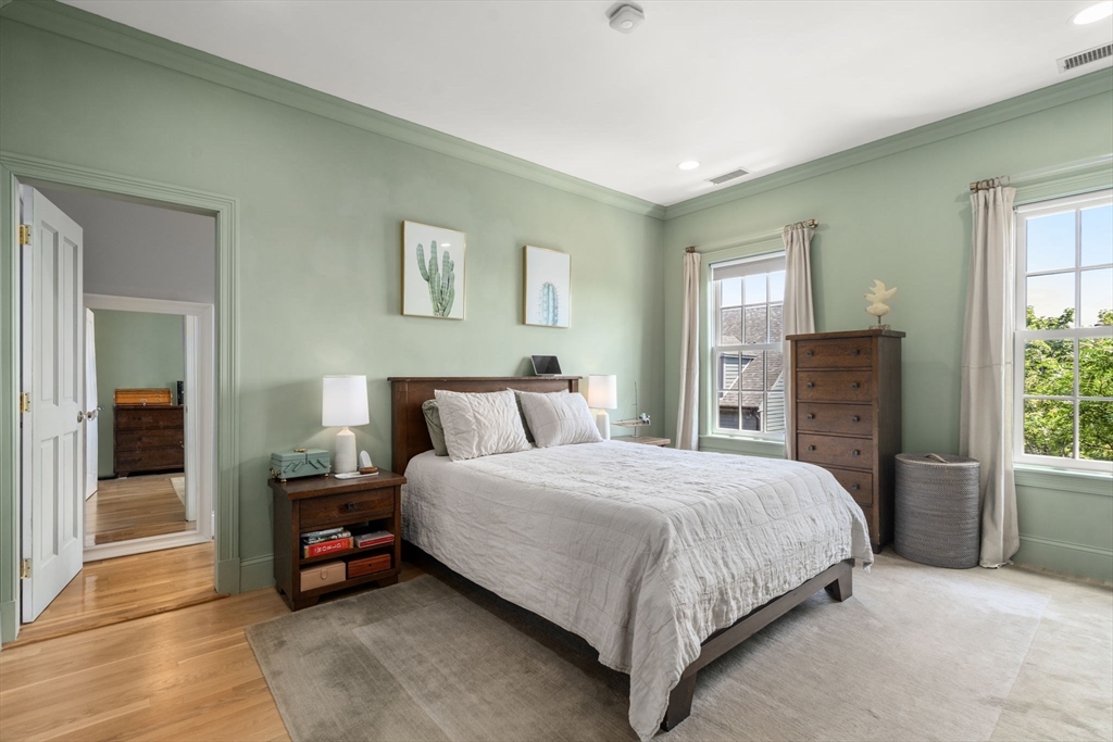 48 Mt Vernon Street, Unit 3 Boston, MA 02129 - Photo 12 of 31 a bedroom with a bed and a couch