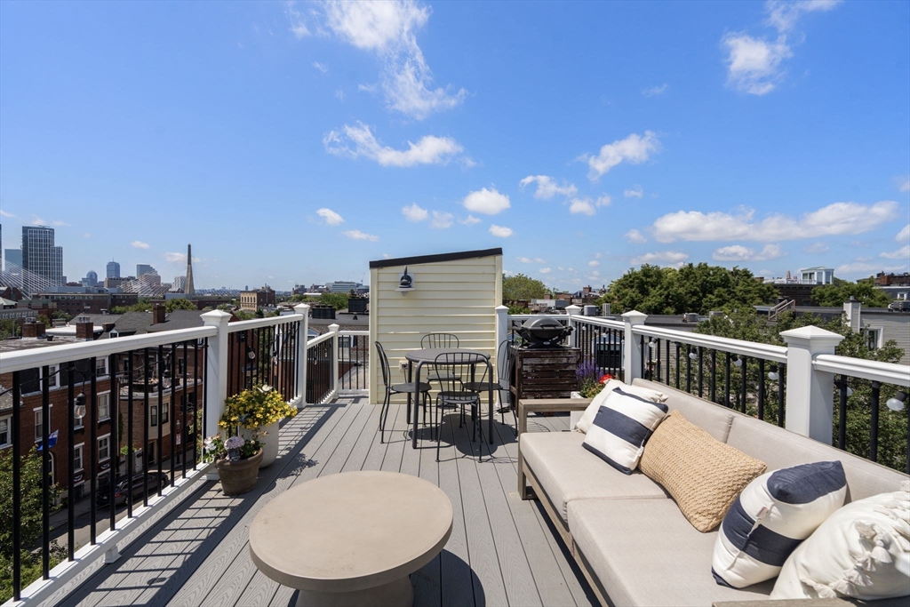 48 Mt Vernon Street, Unit 3 Boston, MA 02129 - Photo 26 of 31 a view of a balcony with chairs