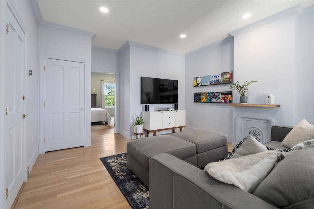 48 Mt Vernon Street, Unit 3 Boston, MA 02129 - Photo 5 of 31 a living room with furniture and a flat screen tv