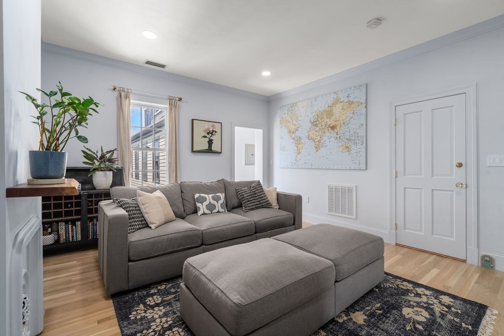 48 Mt Vernon Street, Unit 3 Boston, MA 02129 - Photo 6 of 31 a living room with furniture and a couch