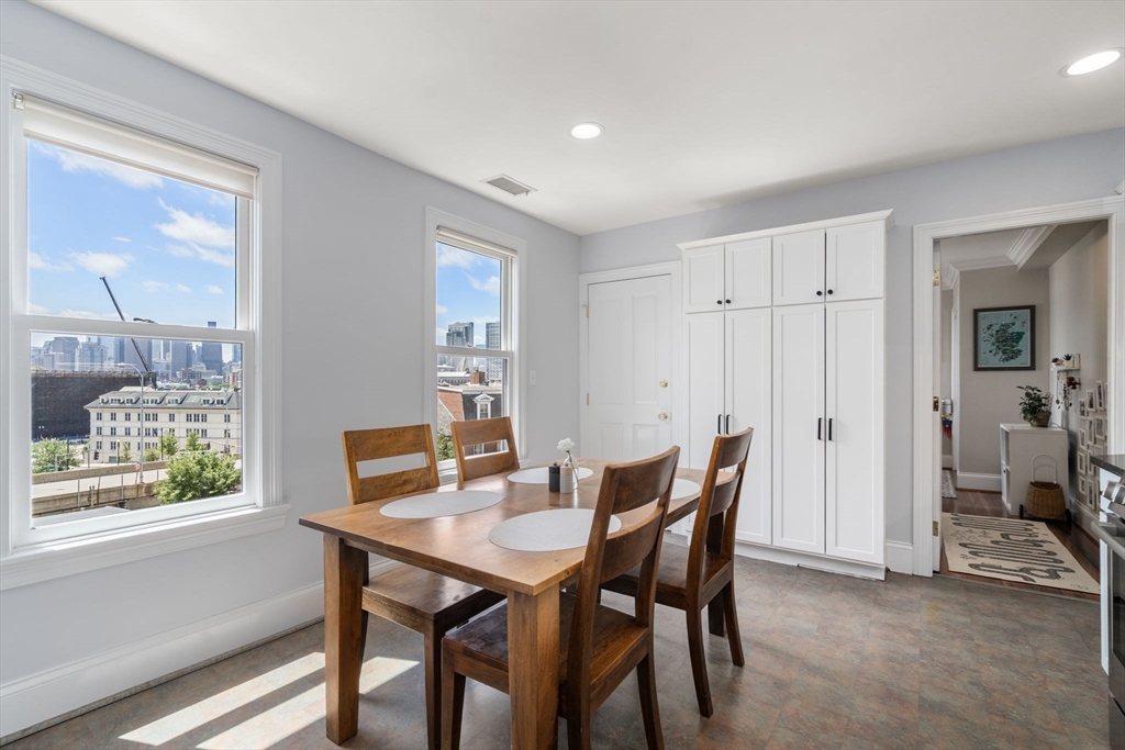 48 Mt Vernon Street, Unit 3 Boston, MA 02129 - Photo 10 of 31 a view of a dining room with furniture window and outside view