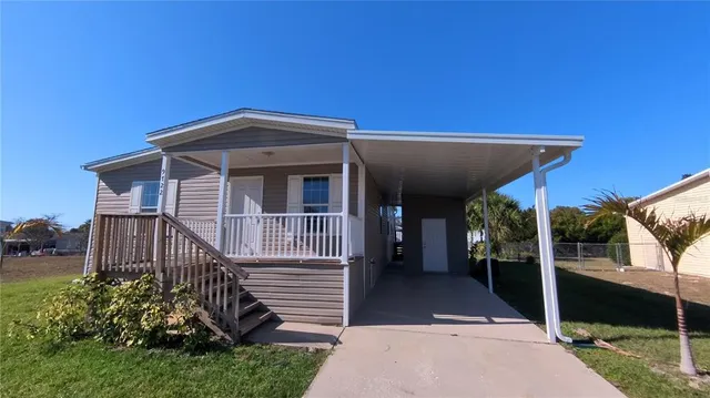 a front view of a house with a porch