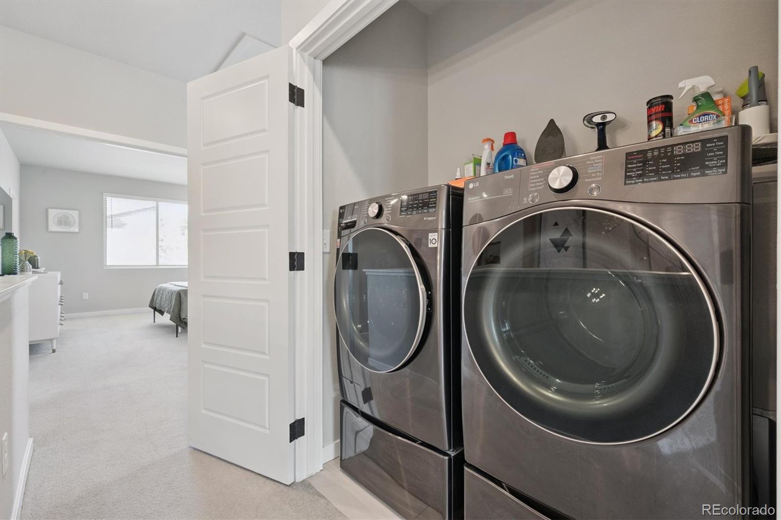 11772 West 45th Place Wheat Ridge, CO 80033 - Photo 22 of 25 a utility room with dryer and washer