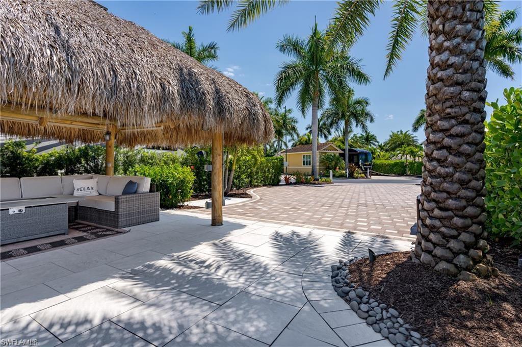 13461 Ladyfish Lane Naples, FL 34114 - Photo 7 of 30 a view of a backyard