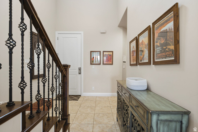 4269 Razor Drive Washington, UT 84780 - Photo 5 of 50 Foyer with light tile patterned floors and stairway