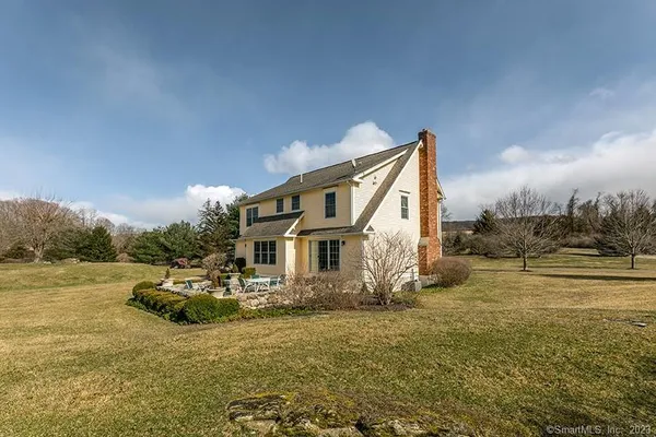 a view of a lake with a house