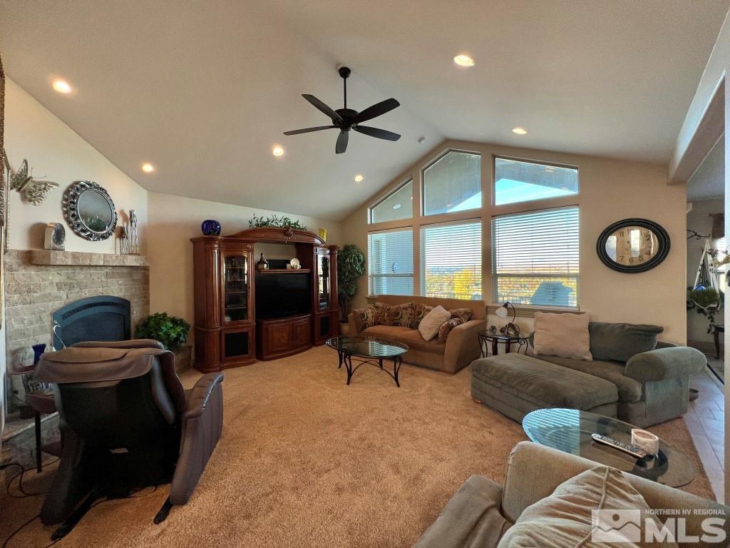 4960 Gila Bend Road Reno, NV 89511 - Photo 8 of 33 a living room with furniture and a fireplace