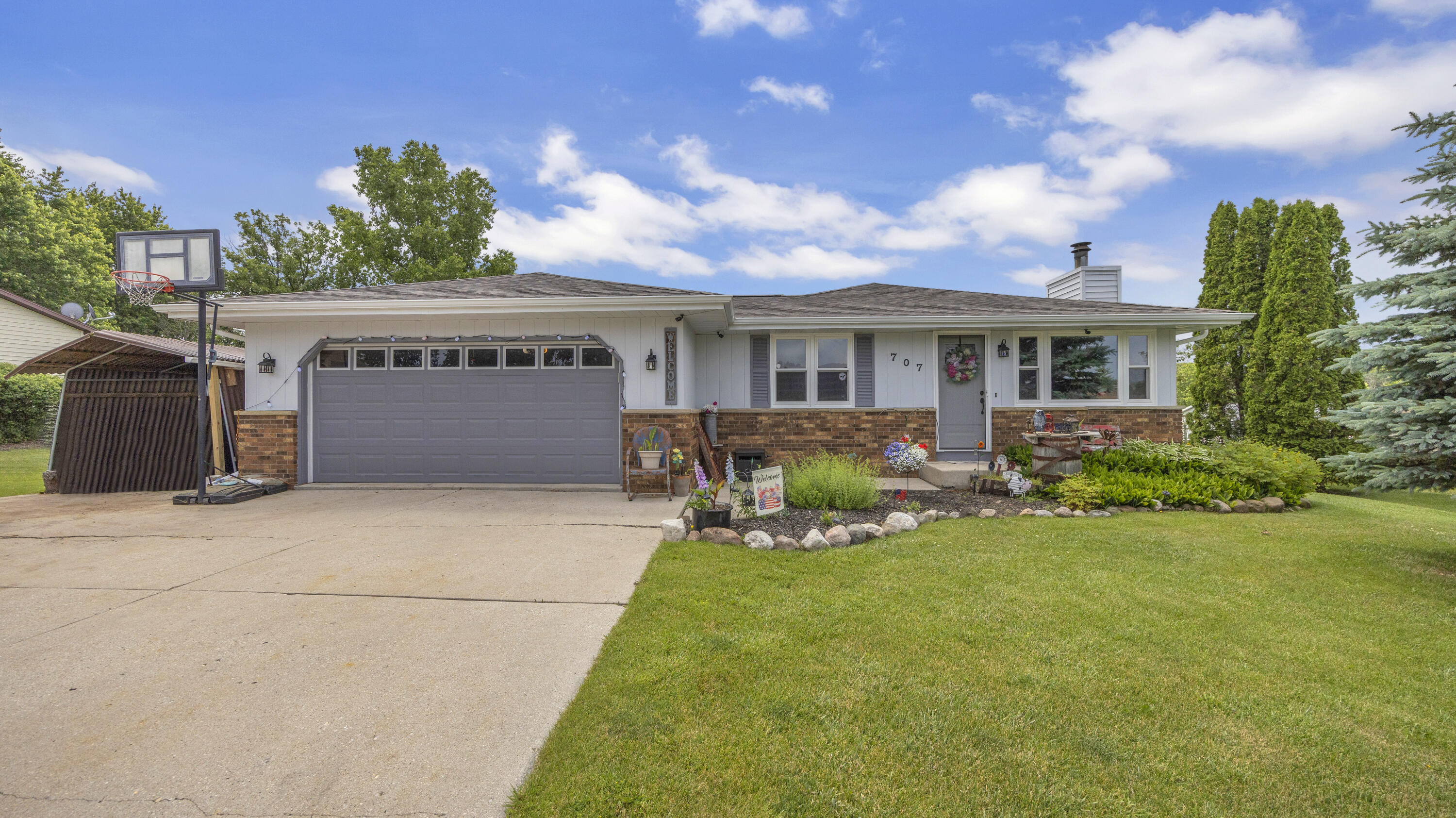 707 Goldfinch Lane Howards Grove, WI 53083 - Photo 1 of 27 Front Yard
