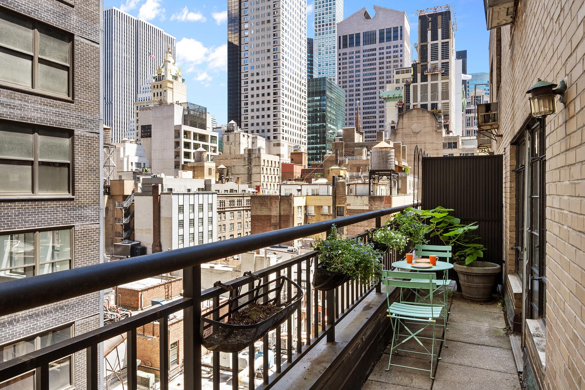 45 West 54th Street, Unit 11/12A Manhattan, NY 10019 - Photo 13 of 18 a city view from balcony