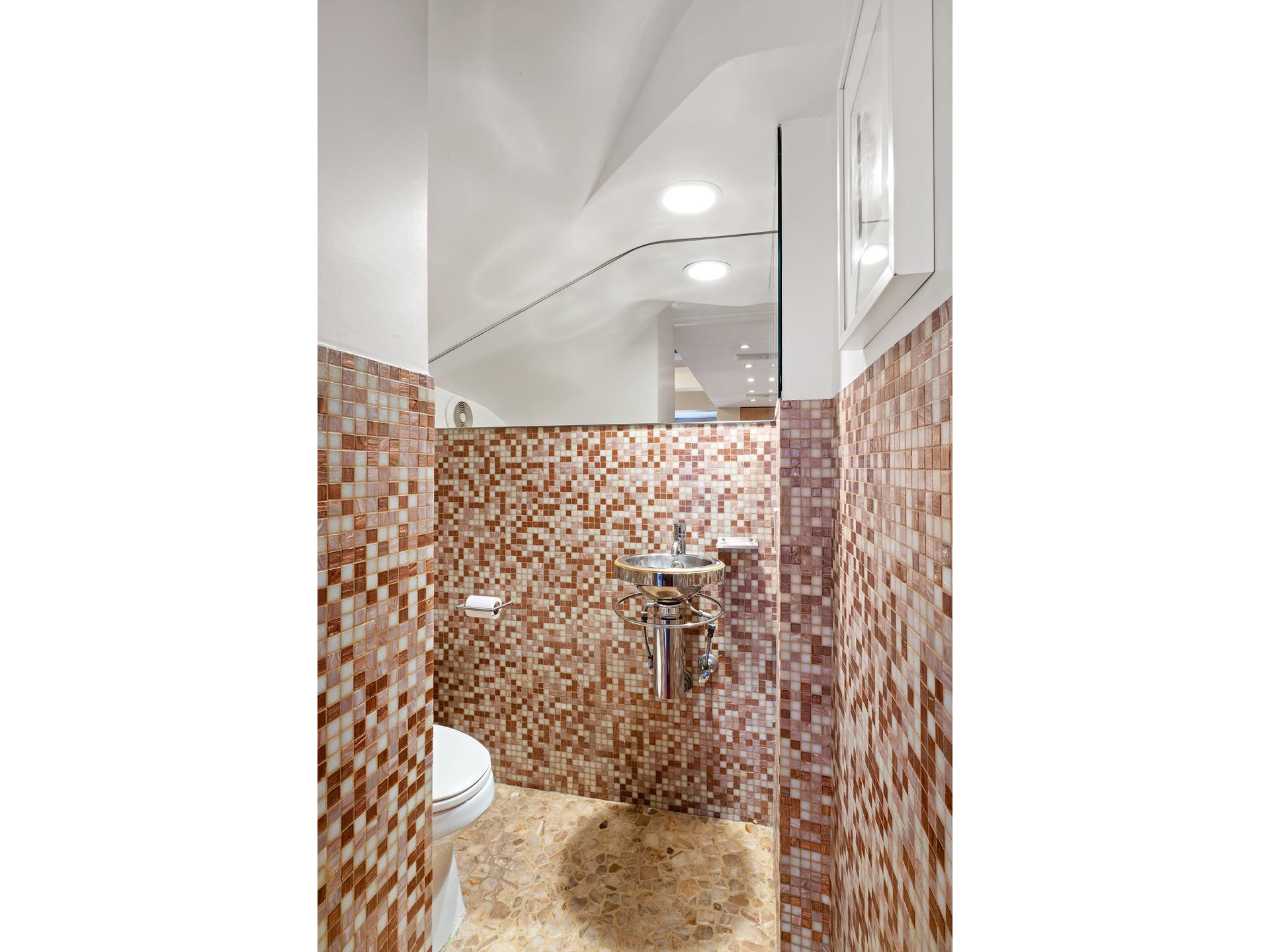 45 West 54th Street, Unit 11/12A Manhattan, NY 10019 - Photo 15 of 18 a bathroom with a shower