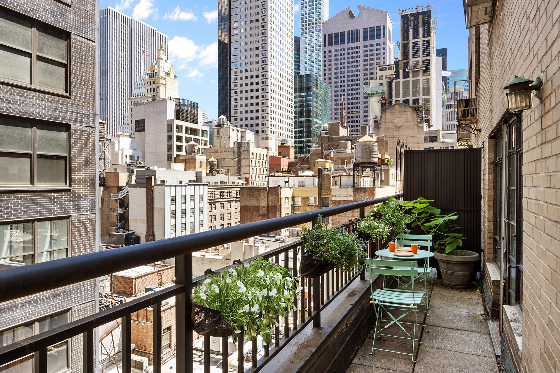 45 West 54th Street, Unit 11/12A Manhattan, NY 10019 - Photo 4 of 18 a view of balcony with furniture