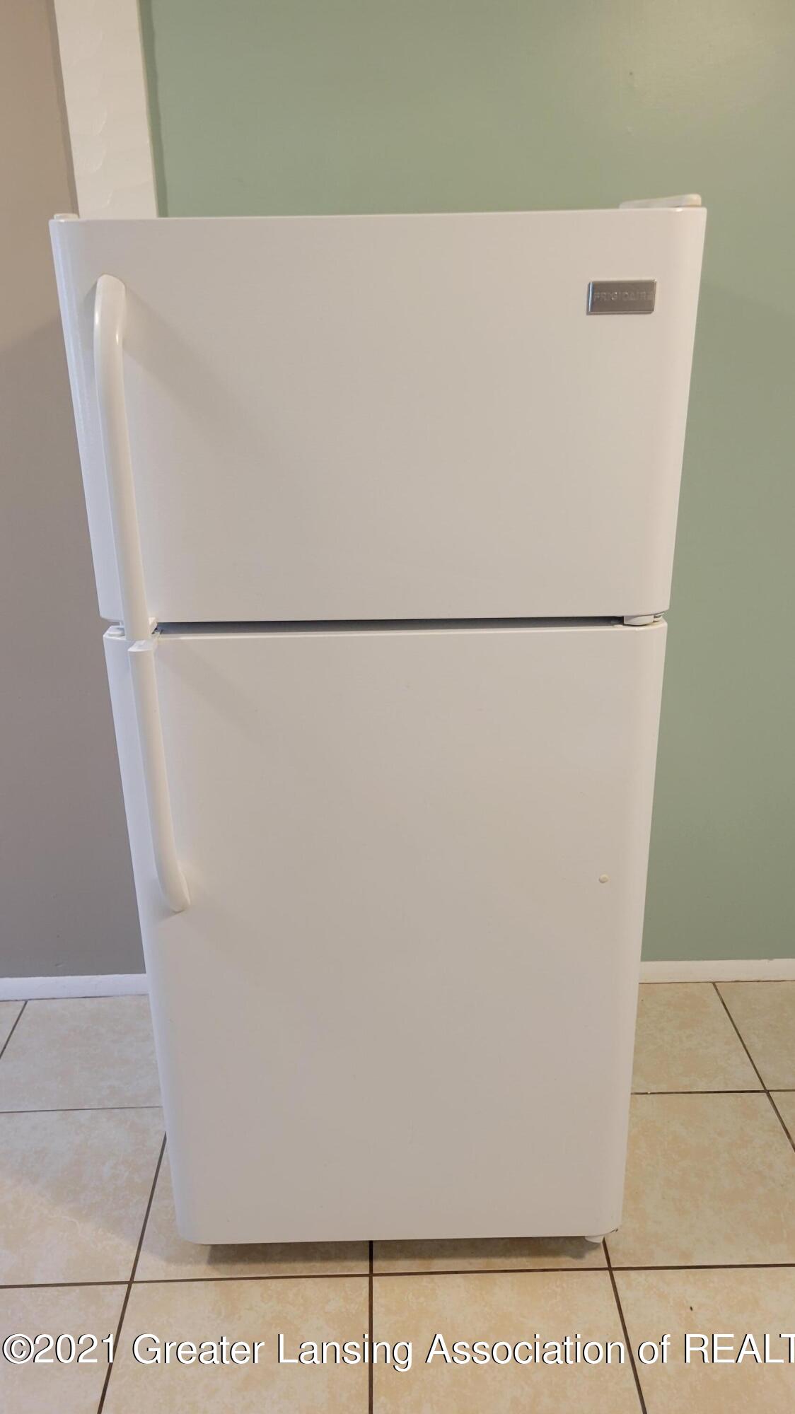 4908 Christiansen Road Lansing, MI 48910 - Photo 8 of 31 Refidgerator