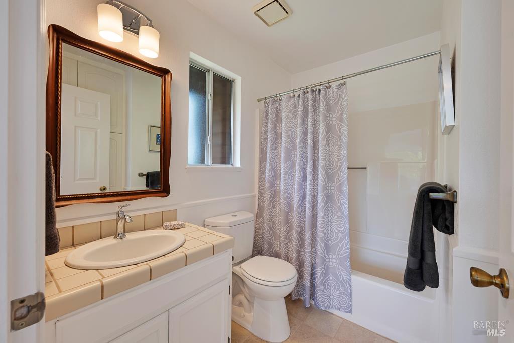 4542 Thomas Road Sebastopol, CA 95472 - Photo 26 of 60 a bathroom with a sink a toilet and shower