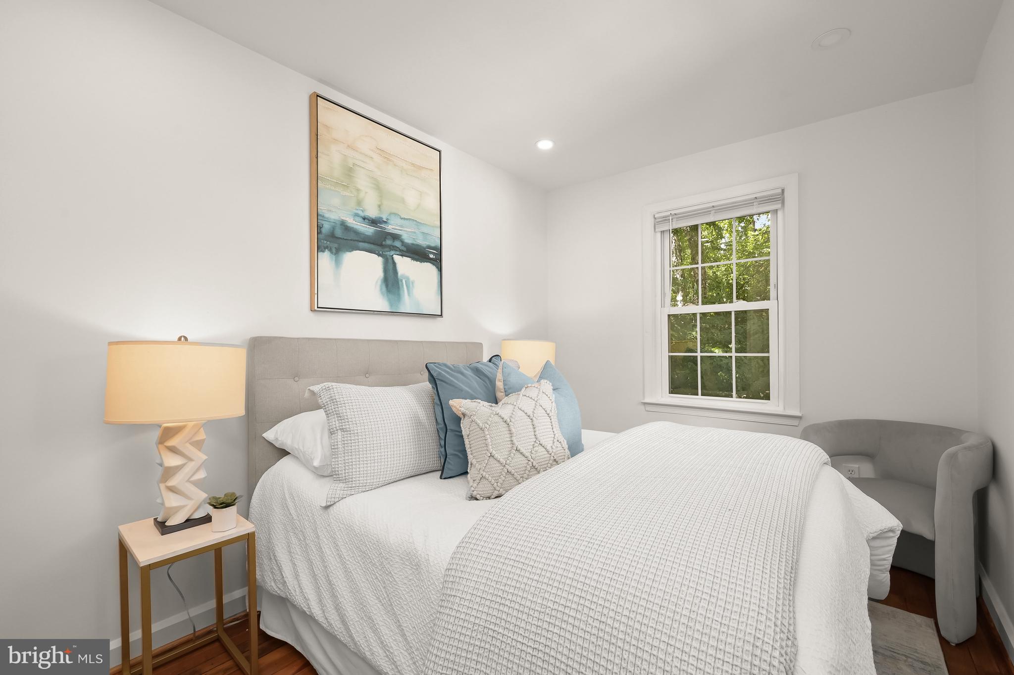 2805 Olive Street Northwest Washington, DC 20007 - Photo 19 of 30 a bedroom with a bed and a window